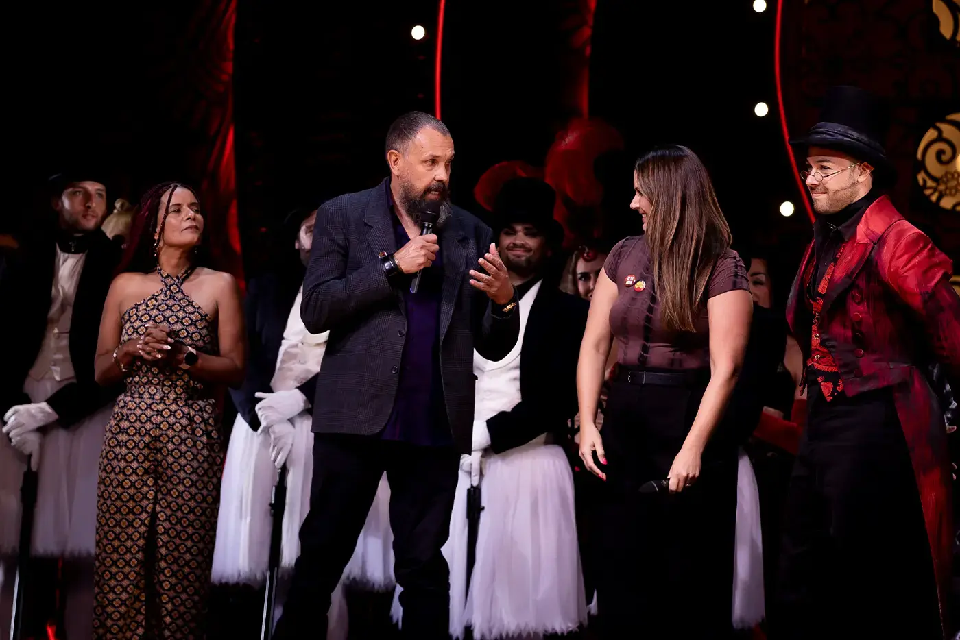 Miranda from Jilya Institute for Mental Health for Indigenous communities and Maitland and Bobbie from Yirra Yaakin Theatre co on stage at Moulin Rouge! The Musical with Jarrod Draper (Toulouse-Lautrec)