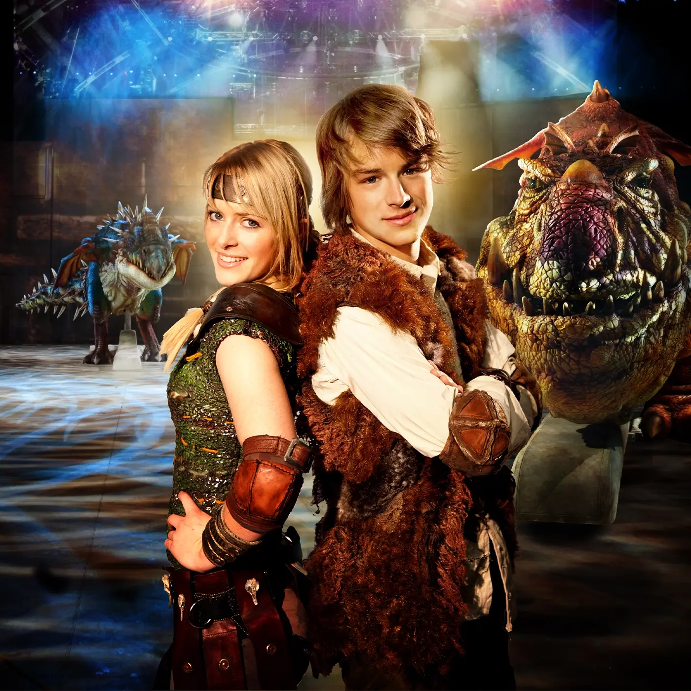 Astrid and Hiccup with dragons in the background