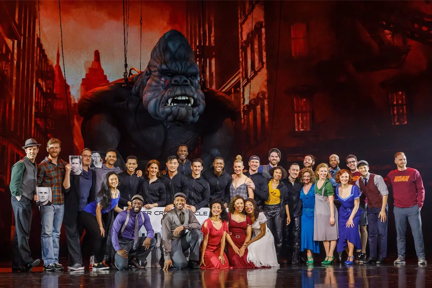 King Kong cast on stage with Kong to celebrate their outer critics circle Award wins
