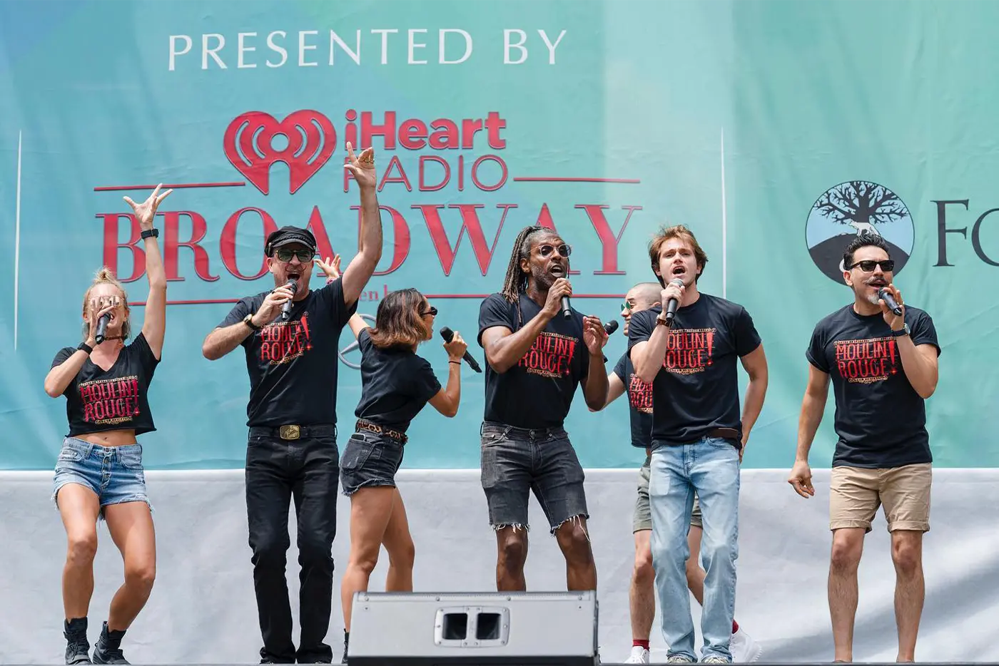 Moulin Rouge! The Musical cast members performing at the 'Broadway in Bryant Park' concert.