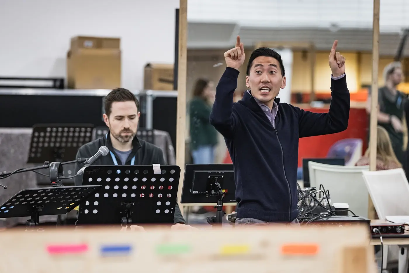 Music Supervisor Ted Arthur directing a song during rehearsals of the Moulin Rouge! The Musical World Tour.