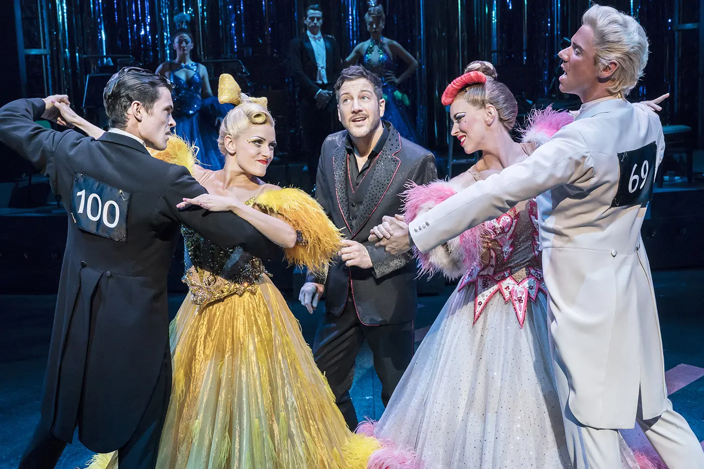 Couple 100 vs couple 69 staring at each other on the dance floor