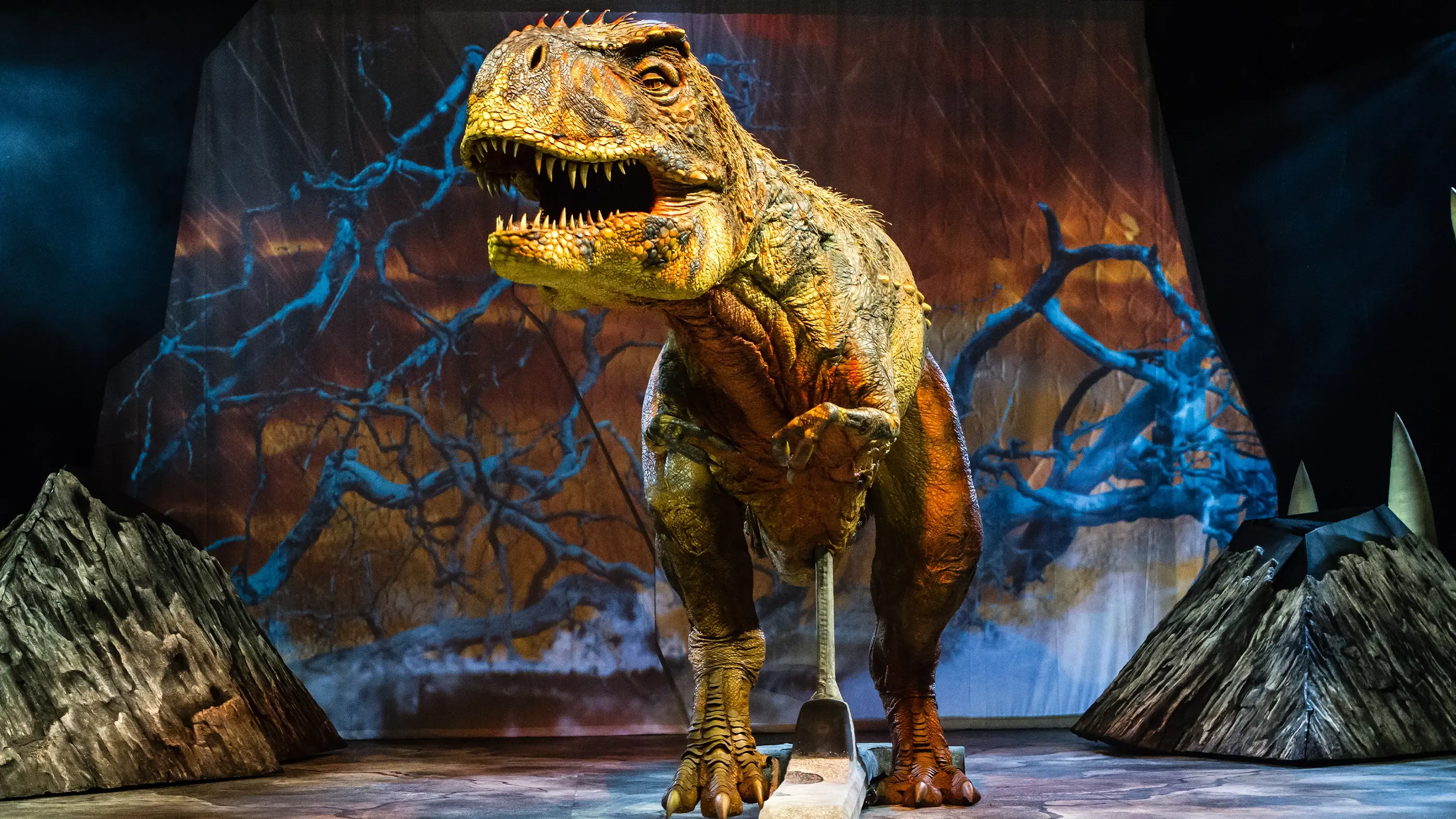 Walking with Dinosaurs live arena show featuring a T-rex puppet