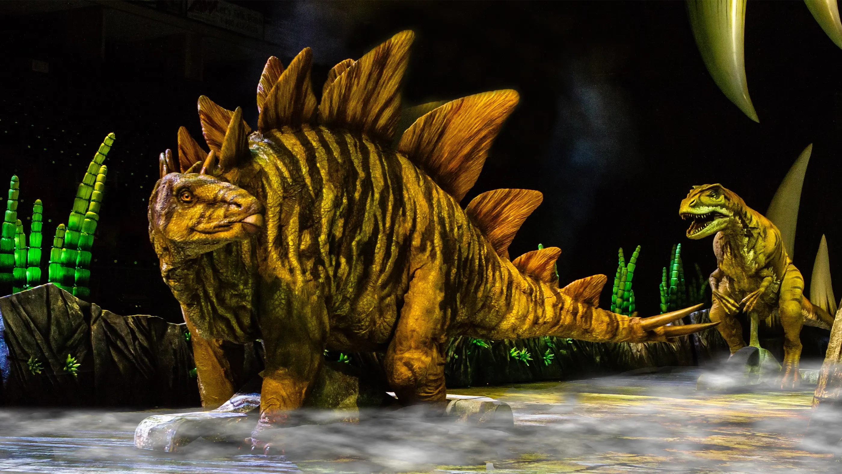 Stegosaurus and Allosaurus in Walking with Dinosaurs live arena show